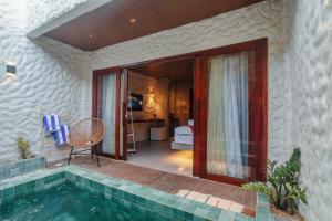 a house with a swimming pool next to a bedroom at Amana Icaraizinho in Amontada +73 photos