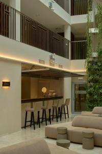 an open kitchen and living room in a house at Mana Suites & Sea in Palanga +77 photos