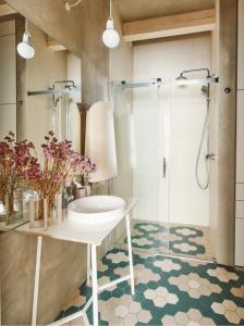 a bathroom with a sink and a shower at Design stone villa nearby the Baltic sea, 4BR, 5BA in Skulte
