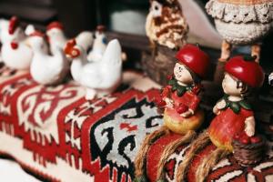 a group of toy figurines on a christmas cake at CasaMaria in Slănic-Moldova