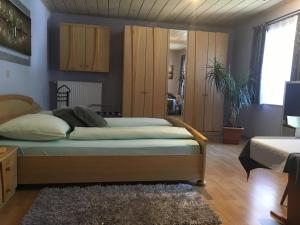 Postel nebo postele na pokoji v ubytování Leitner