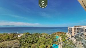 Fotografie z fotogalerie ubytování New 3BR Condo - Oceanview Terrace - Private Beach v destinaci Higuera Blanca