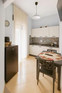 Η κουζίνα ή μικρή κουζίνα στο Archè apartment AGRIGENTO