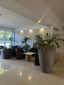 Khu vực ghế ngồi tại Öreg-tó Hotel és Rendezvénytér