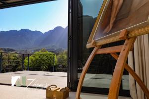 a room with a view of the mountains at The Bishops Villa in Cape Town