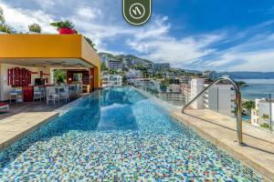 Πισίνα στο ή κοντά στο Amazing 1 BR Condo - Rooftop Pool - Bay View