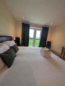 Postel nebo postele na pokoji v ubytování The Castle Inn hotel + 14 fotografií