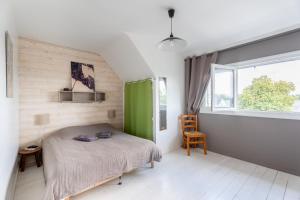 Postel nebo postele na pokoji v ubytování Hent Ar Mor - Maison avec jardin