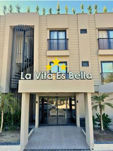 a building with the villas bellola sign on it at La Vita Es Bella in Antalya
