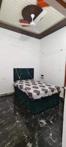 Ένα ή περισσότερα κρεβάτια σε δωμάτιο στο Bhumika home stay +6 φωτογραφίες