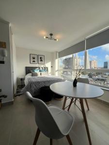 Un lugar para sentarse en Depto Nuevo Exclusivo con Estacionamiento