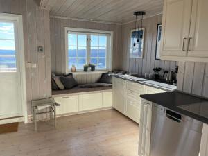 Køkken eller tekøkken på Panorama 4 C Ski inn and out with views of Slettefjell