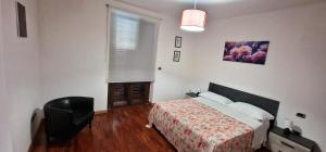 Giường trong phòng chung tại Renée Guest House