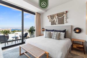 Ένα ή περισσότερα κρεβάτια σε δωμάτιο στο Luxury Oceanview Condo - Rooftop Pool - Downtown +35 φωτογραφίες