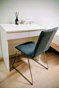 a white desk with a chair in front of it at Comfy room - Ski center - near Ås - 11 min to Oslo in Ski
