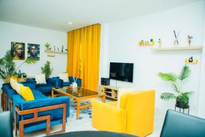 Μια τηλεόραση ή/και κέντρο ψυχαγωγίας στο Cozy Apartment Riviera Palmeraie