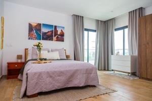 Ένα ή περισσότερα κρεβάτια σε δωμάτιο στο Cozy Apartment Riviera Palmeraie