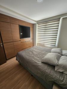 Ένα ή περισσότερα κρεβάτια σε δωμάτιο στο new apartment +13 φωτογραφίες