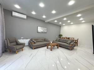 Posezení v ubytování House Mukhrani