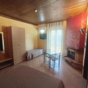 Postel nebo postele na pokoji v ubytování B&B al CASTELLO Torremaggiore