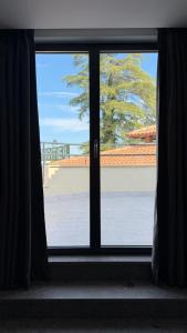 an open window with a view of a building at Eurogarden Hotel in Rome