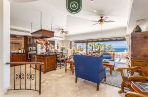 a kitchen and living room with a view of the ocean at Amazing Villa with 3BR - Private Pool in El Tule