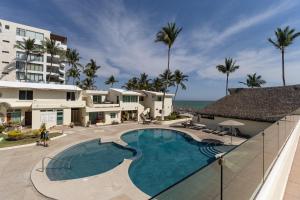 Bazén v ubytování Costa Dorada Costa 402 nebo v jeho okolí