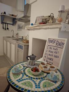 Η κουζίνα ή μικρή κουζίνα στο Casa vacanze PetraCielo