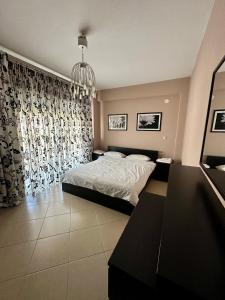 Postel nebo postele na pokoji v ubytování REM Apartments
