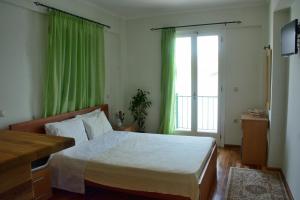 Postel nebo postele na pokoji v ubytování Lazaretto Palace + 29 fotografií