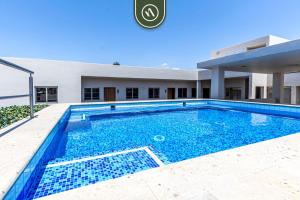 Bazén v ubytování Centric 1BR Condo in Downtown Cabo - Rooftop Pool nebo v jeho okolí