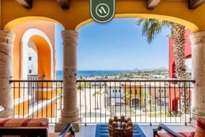 a balcony with a view of the ocean at 2BR Condo with Private Terrace - Ocean View - Pool in El Tule