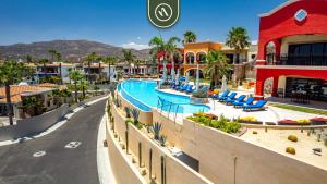 arial view of a resort with a swimming pool at 2BR House with Ocean View in Cabo in El Tule