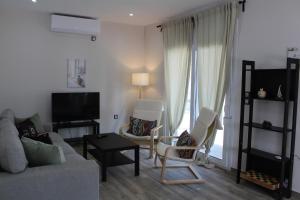 Χώρος καθιστικού στο Euphoria Apartments