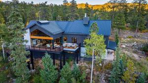 an aerial view of a house with a blue roof at 2001 Lake Purgatory Drive in Durango