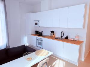 Η κουζίνα ή μικρή κουζίνα στο TAYP Navalmoral Apartamentos