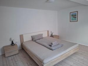 Postel nebo postele na pokoji v ubytování Ferienhaus Adler