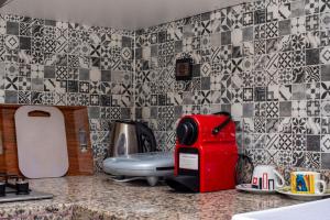 Η κουζίνα ή μικρή κουζίνα στο Cozy Vibes in the Heart of Ville Haute