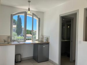 Η κουζίνα ή μικρή κουζίνα στο Appartement en Luberon