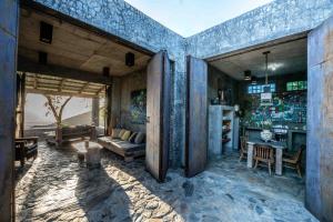 a living room with a couch and a table at House Cottage in Caribbean Mountains 2 