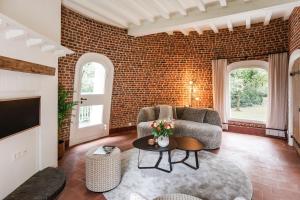 Posezení v ubytování De Zwarte Molen - erfgoedlogie in het groen