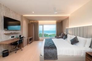 TV a/nebo společenská místnost v ubytování OCEAN PEARL