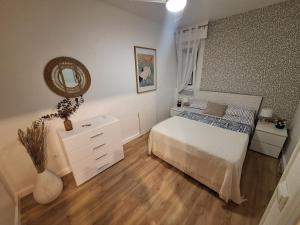 En eller flere senge i et værelse på MaGorja Torrevieja Residences