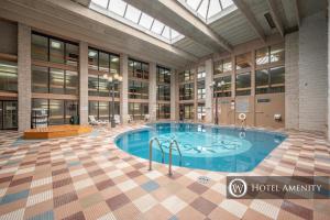 a large pool in the middle of a building at 508G Two Bedroom One Bath in Thayerville