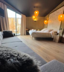 Postel nebo postele na pokoji v ubytování Hostellerie Normande