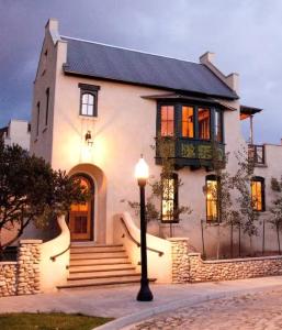 a large white house with a street light in front of it at Aspen Courtyard Residence in Buena Vista