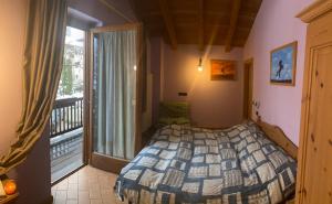 Postel nebo postele na pokoji v ubytování Agritur Locanda San Martino