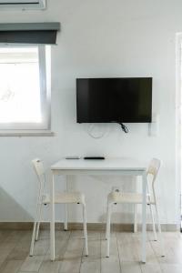 TV a/nebo společenská místnost v ubytování Casa das Pipas Palmela #5