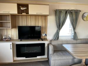 Et tv og/eller underholdning på Sand Dollar, Silver Sands Holiday Park