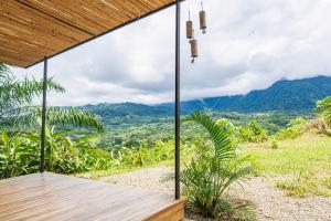 a patio with a view of a mountain at Casa Morpho in San Luis +16 photos